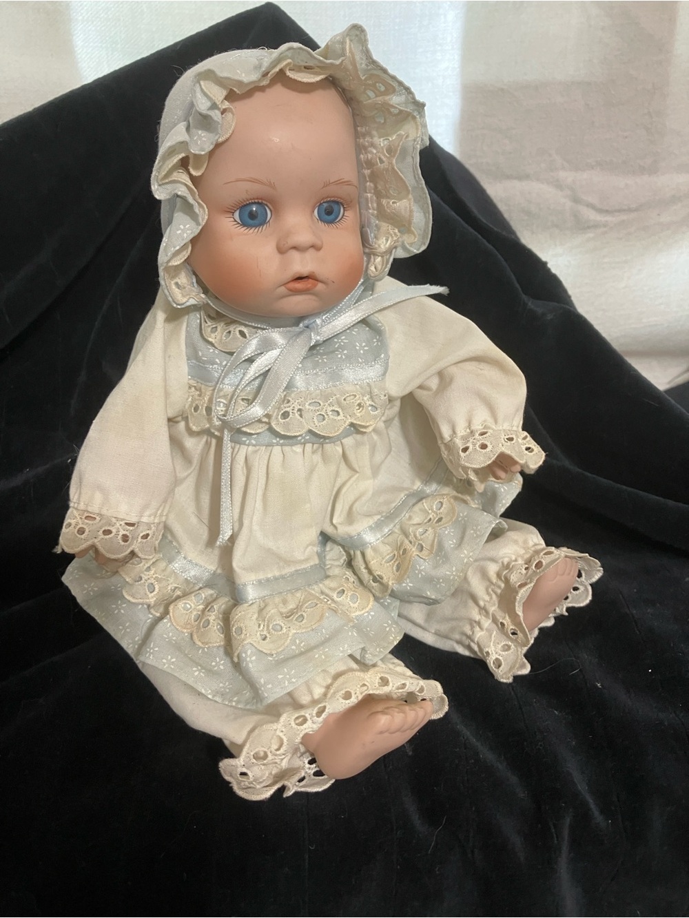 Vintage-Style Porcelain Baby Doll in Cream and Light Blue Outfit
